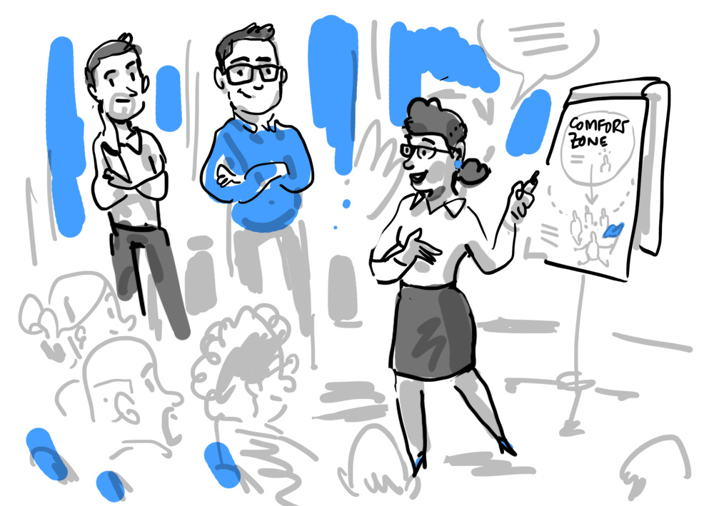 Dieselbe Kollegin steht nun selbst am Flipchart und präsentiert sichtbar souverän vor zwei Teammitgliedern